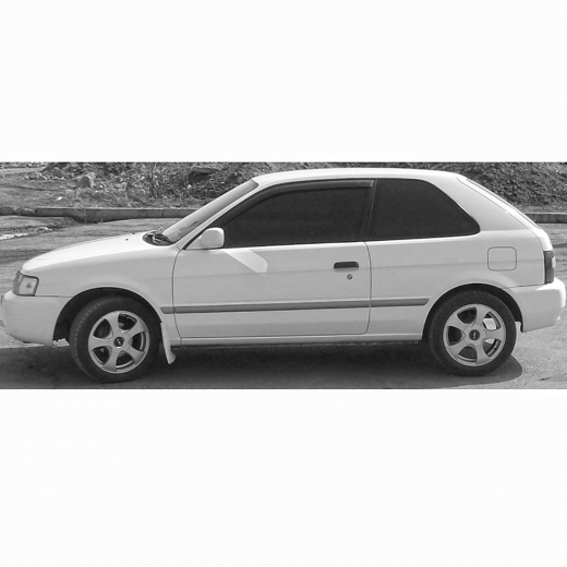 Стекло боковое в кузов Toyota Tercel/ Corsa/ Corolla II '94-'99 (3Door) заднее левое контрактный