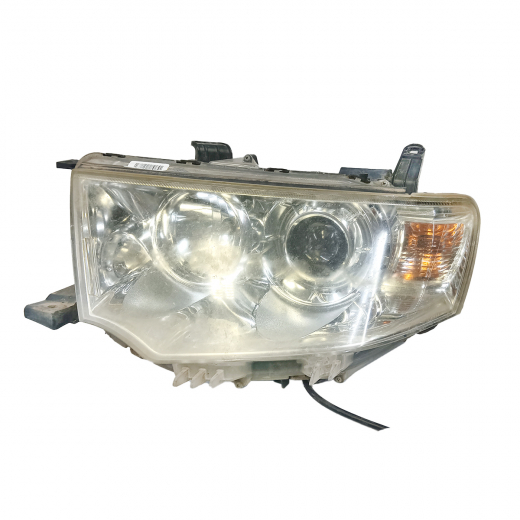 Фара Mitsubishi Pajero Sport '08-'16/ L200 '13-'16 левая (8301B305) контрактная