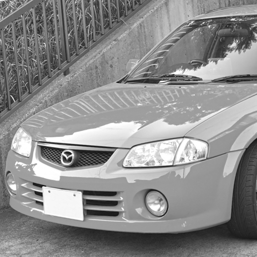 Решетка радиатора Mazda Familia Sport '98-'00 контрактная