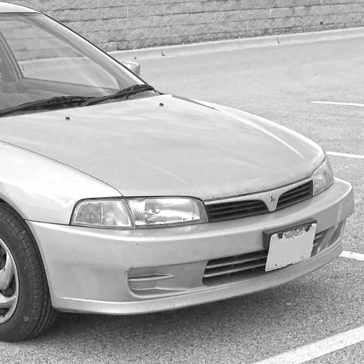 Решетка радиатора Mitsubishi Lancer/ Mirage Sedan '95-'97 контрактная
