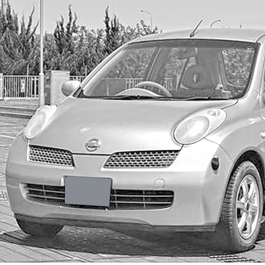 Решетка радиатора Nissan March/ Micra '02-'05 левая с повторителем контрактная 