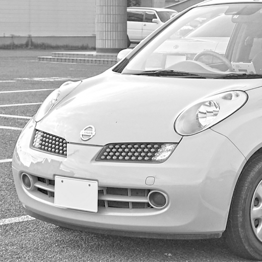 Решетка радиатора Nissan March '05-'07 левая с повторителем контрактная