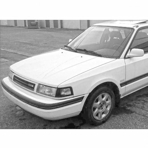 Крыло переднее Mazda Familia '89-'94 левое контрактное