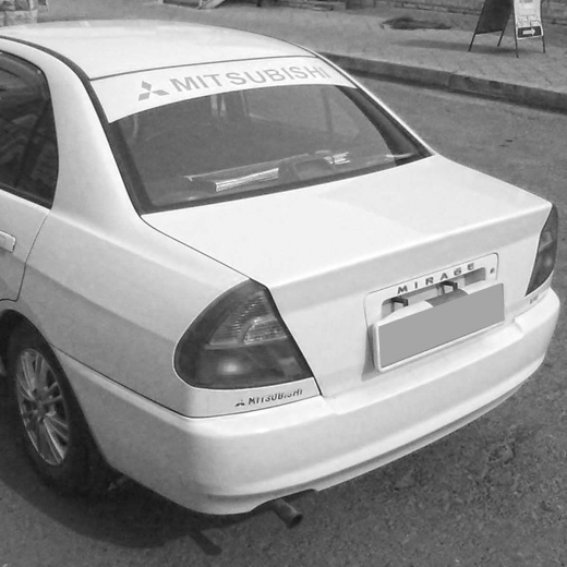 Бампер задний Mitsubishi Mirage / Lancer '95-'00 контрактный Sedan