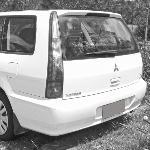 Бампер задний Mitsubishi Lancer '03-'08 контрактный Wagon
