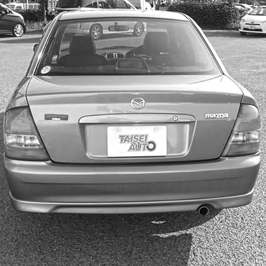 Крышка багажника Mazda Familia '98-'04  контрактная